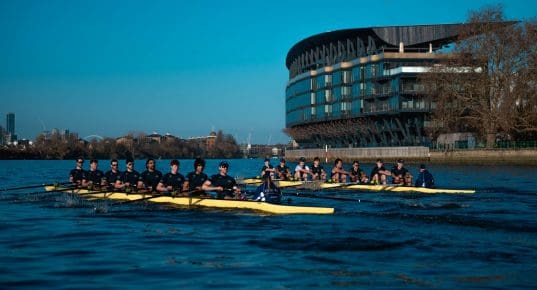 Crews racing past Fulham Pier